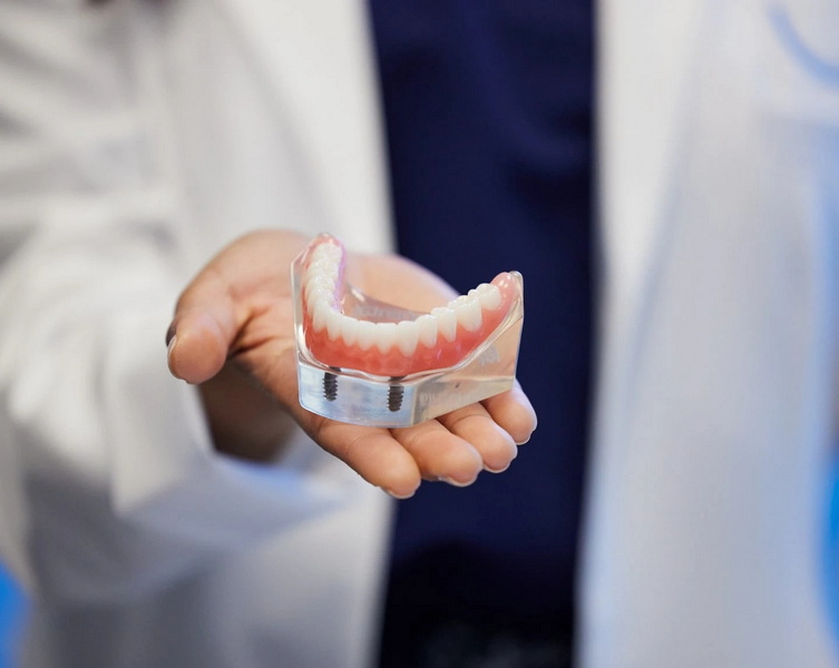 how much does a single back molar dental implant cost