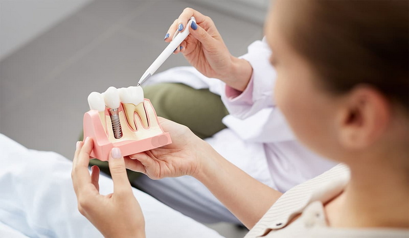 how to remove integrated dental implant