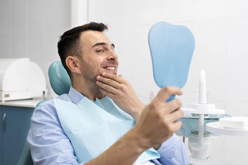 can a dental implant be an abutment in a bridge