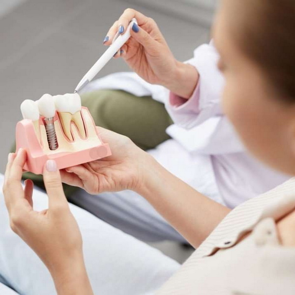 is it painful to have a dental implant removed_1